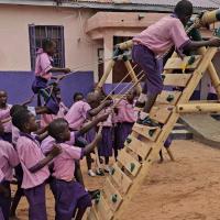 children playing on new play equipment